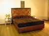 letto-imbottito-in-pelle-enigma