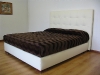 letto-in-pelle-quadri-cuciti