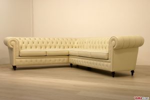 Divano Chesterfield angolare con zampa tornita su misura