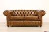 Divano Chesterfield marrone in pelle antica effetto usato