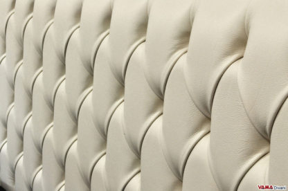 Lavorazione capitonnè testiera importante con cornice in foglia argento