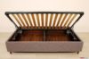 Letto con contenitore ad apertura laterale