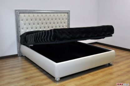 Letto di lusso con testiera in capitonnè e cornice in foglia argento
