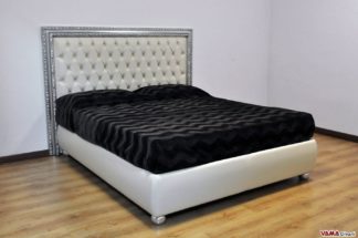 Letto matrimoniale capitonnè con cornice foglia argento