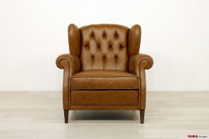 Poltrona bergere in pelle marrone classica in capitonnè