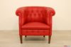 Poltroncina classica con piedi alti in legno