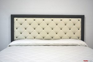 Testiera letto in pelle con cornice imbottita