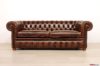 Divano Chesterfield marrone vintage con chiodi