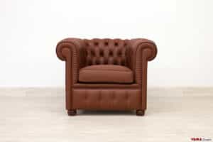 Piccola poltrona Chester in pelle marrone