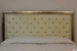 Testata letto capitonnè con cornice in foglia oro