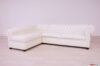 Divano Chesterfield angolare con penisola in pelle avorio