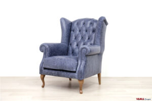 Poltrona Bergere classica con schienale capitonné blu in pelle