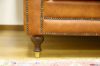 Piedino alto con puntale in ottone