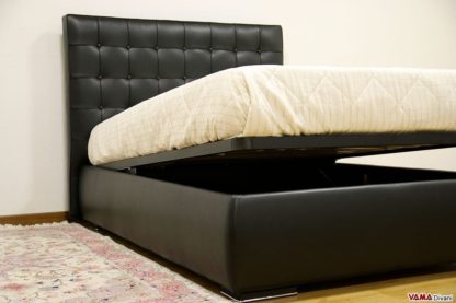 letto con testata trapuntata