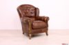 Poltrona classica marrone in pelle e legno