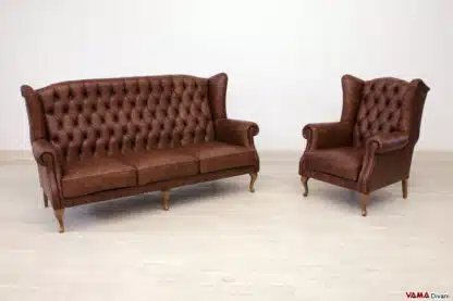 Salotto bergere composto da divano e poltrona in pelle marrone marmorizzata