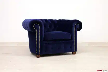 Poltrona Chesterfield blu in velluto