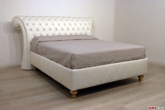 Letto capitonnè classico con piedi foglia oro