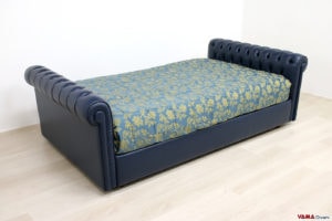 Letto a barca con testate capitonnè