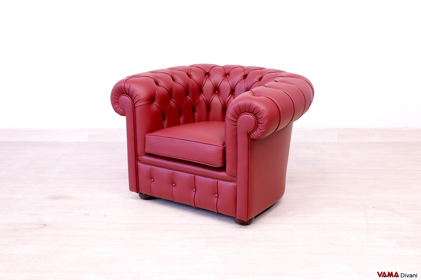 Poltrona Chesterfield bordeaux in pelle spessorata