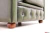 Piedini sferici in legno della poltrona Chesterfield VAMA in pelle verde inglese