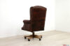 Vista posteriore poltrona da ufficio Chesterfield in pelle marrone ruggine